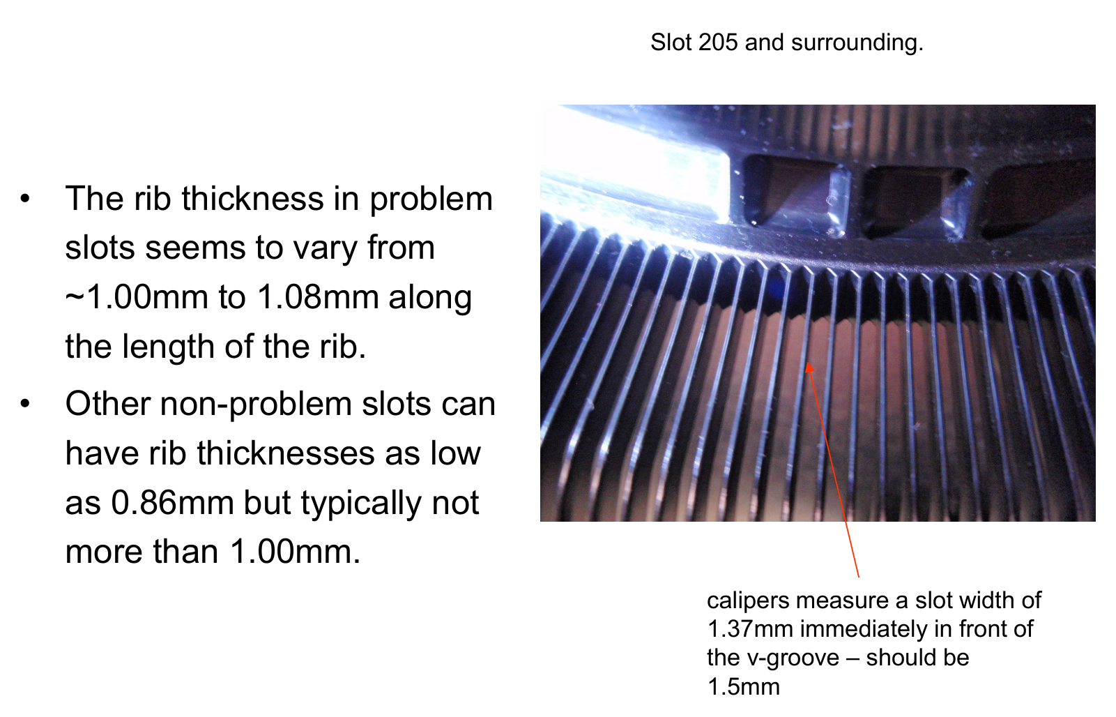 Caliper at slot 205 with the original report describing local rib-thickness and slot-width measurements.