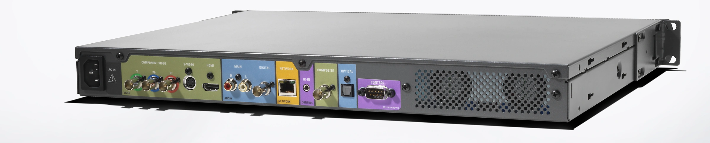 Rear of the KPLAYER-6000 with labeled audio, video, network and control connectors beside ventilation perforations.