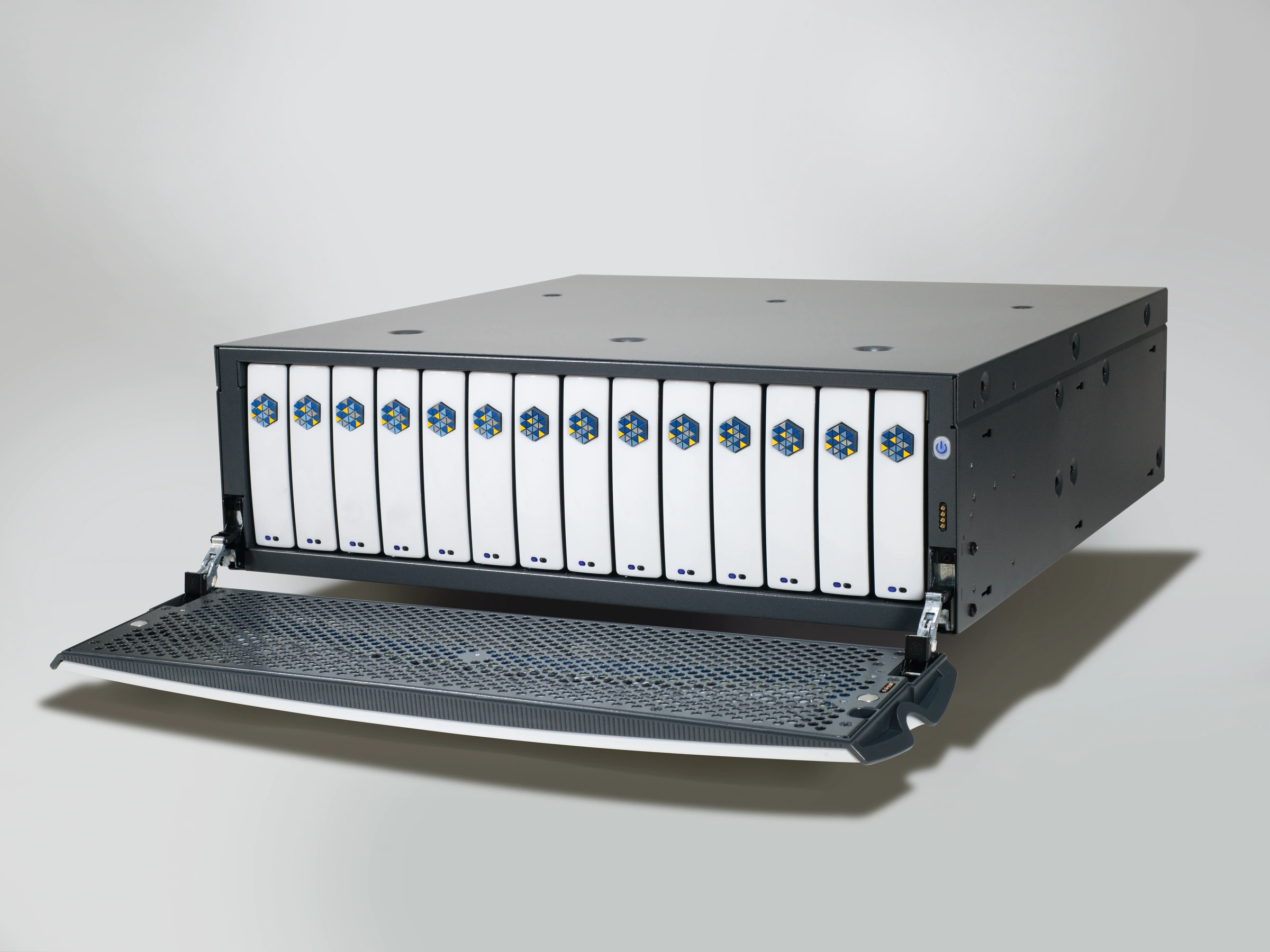 Open KSERVER-5000 front door below a row of fourteen disk cartridges.