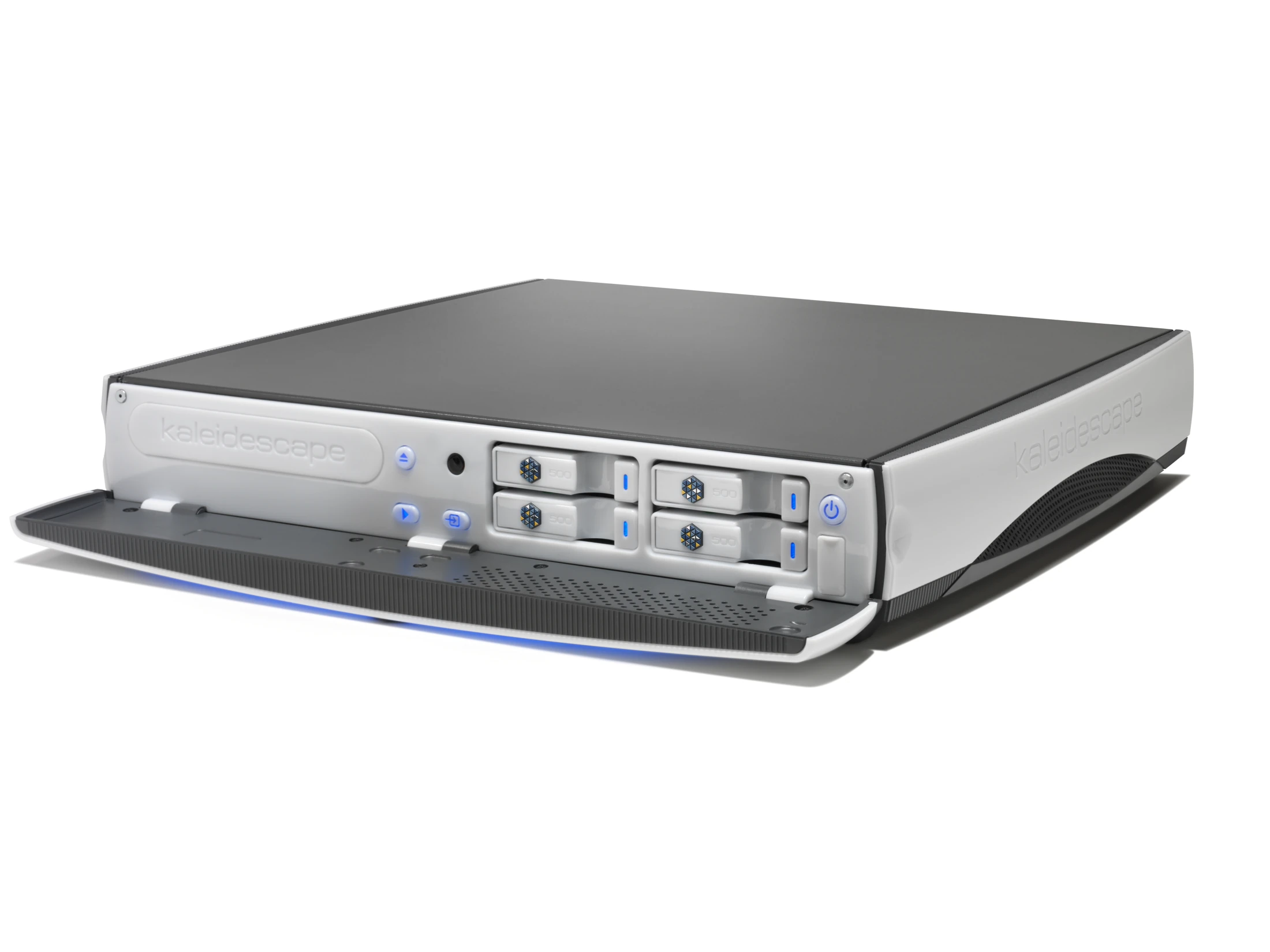 Mini System with its front open, showing the four removable disk cartridges and optical-drive opening. The product enclosure and its service openings; distinct from the later Cinema One.